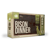 A carton of Big Country Raw dog food, Bison Dinner, 4 lb. (contains four 1 lb patties), requires freezing.