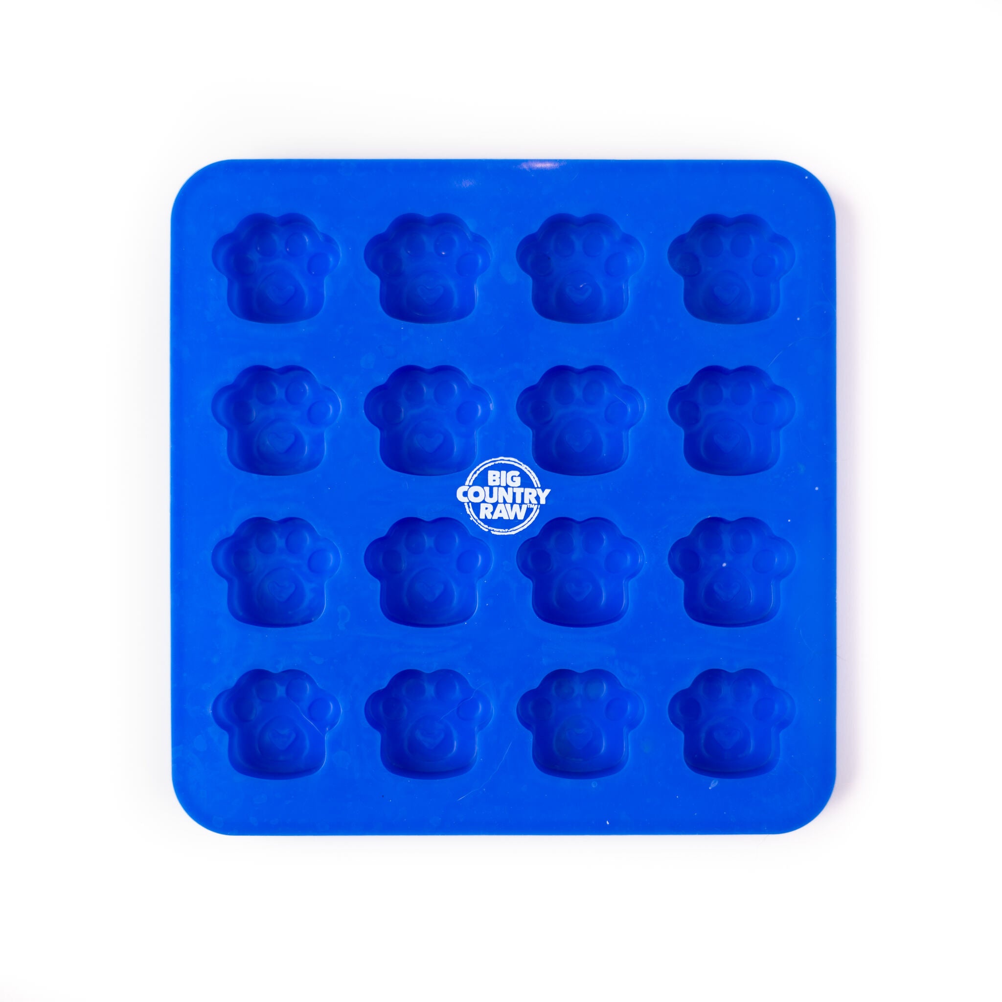 A Big Country Raw Freeze mold, paw pattern, blue with 16 spaces for small paw molds.